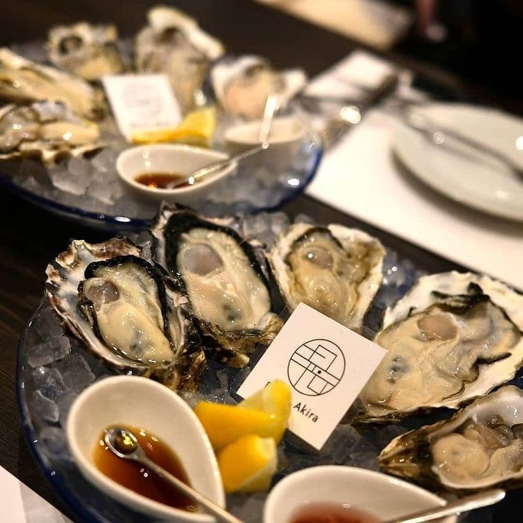 牡蠣と肉たらしビストロAKIRA 心斎橋店 OysterBar bistro AKIRAの店内・料理の写真 2枚目
