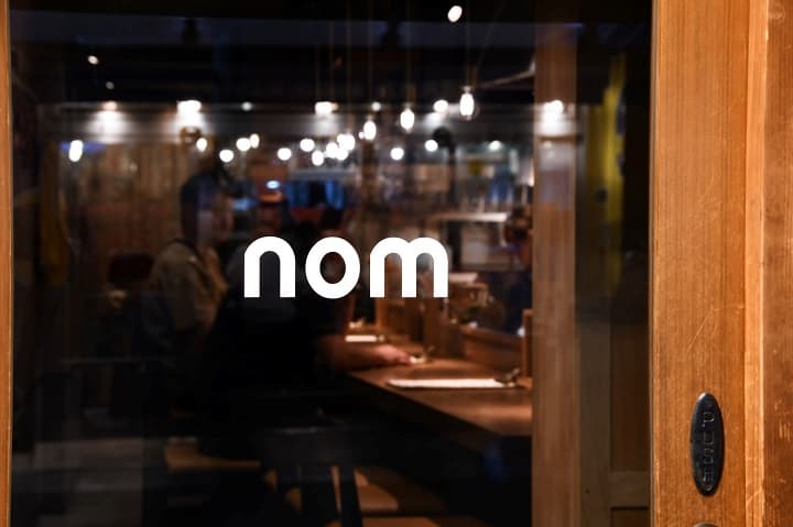 nom